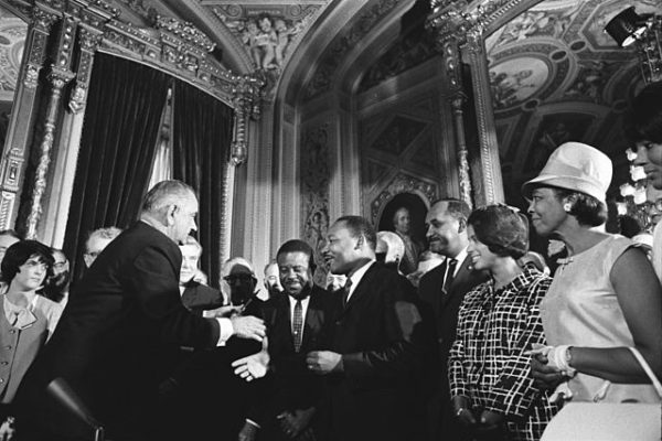 640px-Lyndon_Johnson_and_Martin_Luther_King,_Jr._-_Voting_Rights_Act (1)